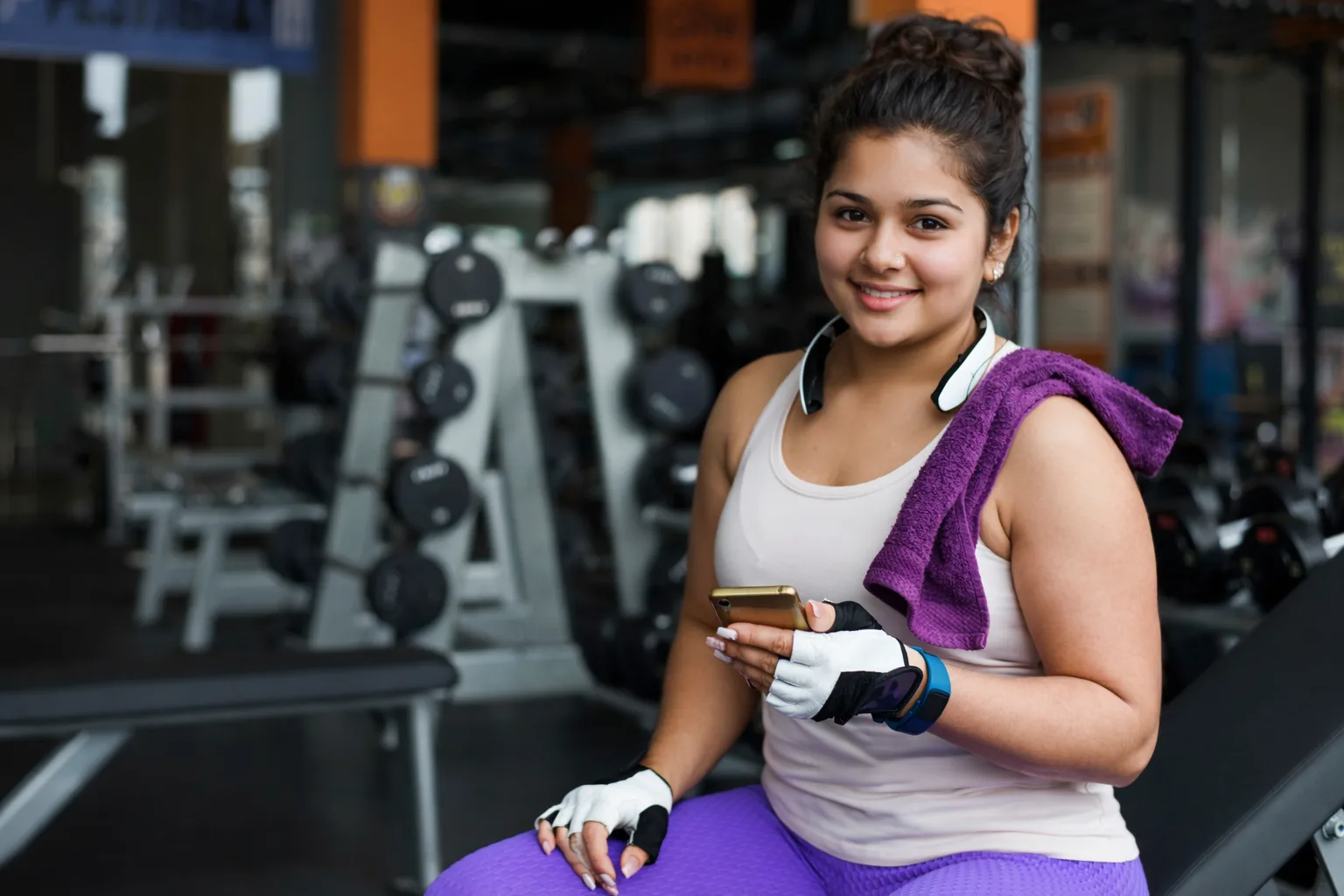 Online personal trainer conducting video consultation with client